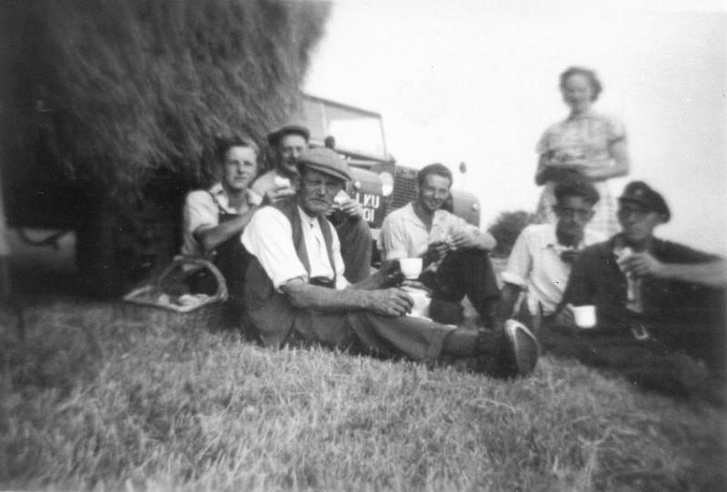 Haytime Thwaites 1957.JPG - Haytime at Thwaites Farm - 1957  Seated from left to right   - Richard Thwaite  - Frank Irving - Simon Thwaite - an Irishman  hired for the haytime - Ted Kayley - Joe Parker   Standing at back is Mary Thwaite.